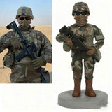 Wearing combat uniform, holding guns, and with a custom combat doll head