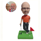 Customized golf doll with head, holding golf club and inserting small red flag